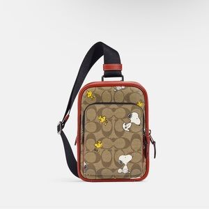 Coach X Peanuts Track Pack 14 In Signature Canvas With Snoopy Woodstock